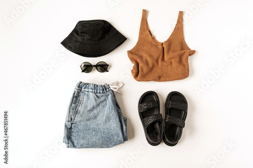 Women's trendy fashion clothes and accessories collage on white background. Flat lay, top view