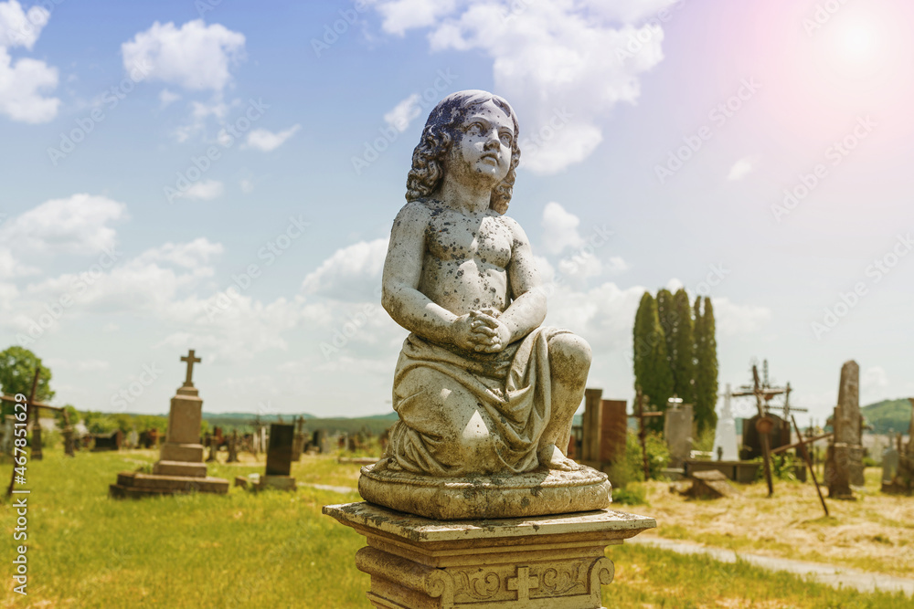 Angel child in prayer. (concept: child loss, death of a child). Angel child in prayer. (concept: child loss, death of a child).