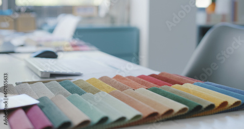 Fabric swatches on a decorator's desk