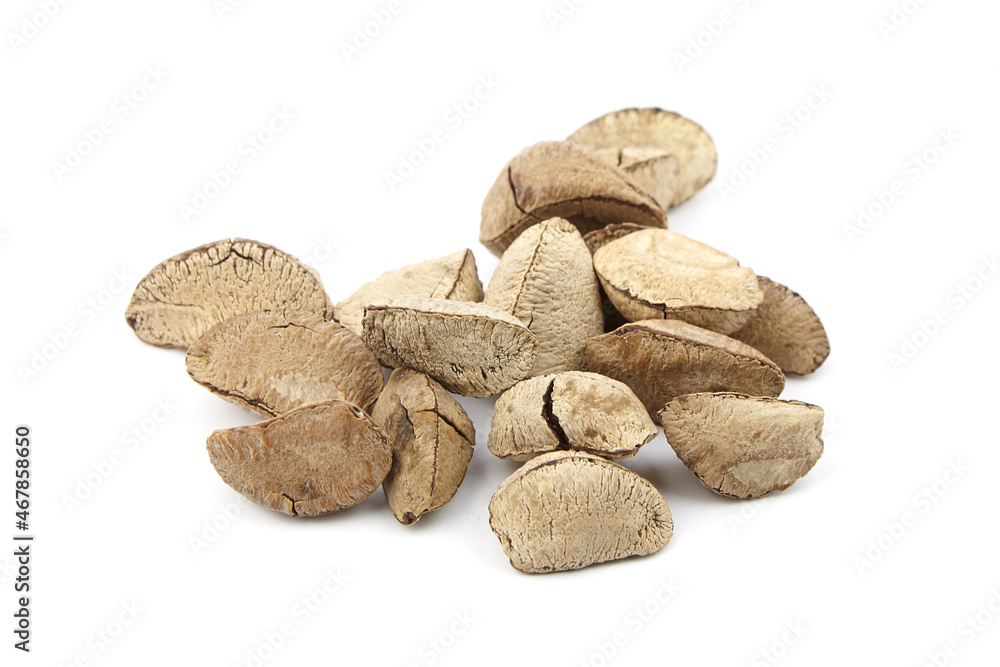 Fototapeta premium Brazil nuts or Bertholletia excelsa seeds isolated on white