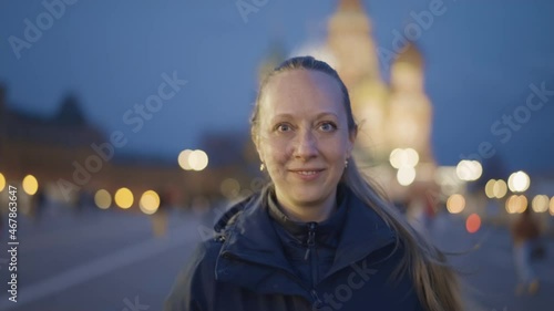 happy russian woman on red square after sunset, Moscow, Russia