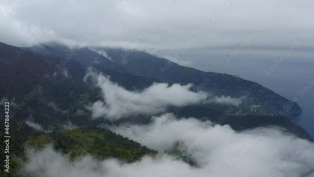 Aerial Forward Beautiful Shot Of Clouds Over Green Mountains, Nautical Vessels Moving In Sea - Cinque Terre, Italy Aerial Forward Beautiful Shot Of Clouds Over Green Mountains, Nautical Vessels Moving In Sea - Cinque Terre, Italy