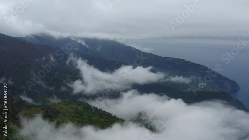 Wallpaper Mural Aerial Forward Beautiful Shot Of Clouds Over Green Mountains, Nautical Vessels Moving In Sea - Cinque Terre, Italy Torontodigital.ca