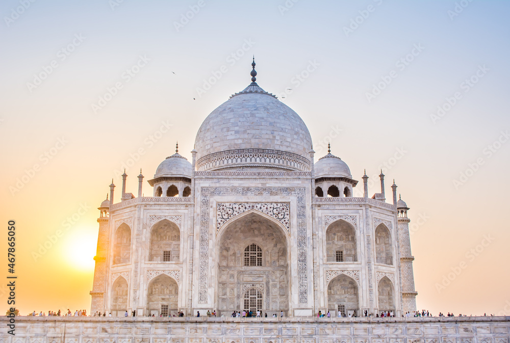 The Taj Mahal is an ivory-white marble mausoleum on the bank of the Yamuna river in the city of Agra, Uttar Pradesh.