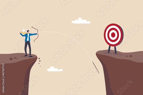 Terribly missed target, failure or mistake, fail to achieve goal, big error or wasted effort concept, overconfidence businessman archery terribly missed target. photo