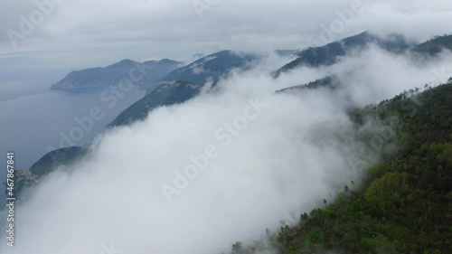 Wallpaper Mural Aerial Beautiful Shot Of Clouds Over Green Mountains, Drone Flying Over Sea - Cinque Terre, Italy Torontodigital.ca