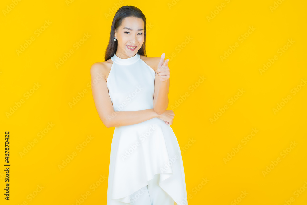 Portrait beautiful young asian woman smile with action Portrait beautiful young asian woman smile with action