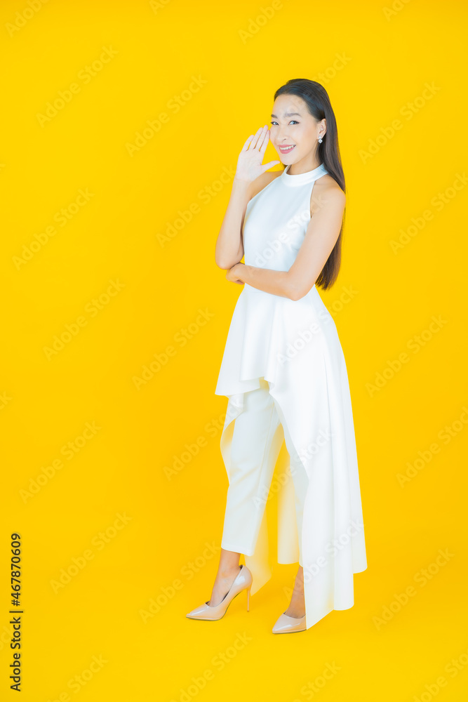 Portrait beautiful young asian woman smile with action Portrait beautiful young asian woman smile with action