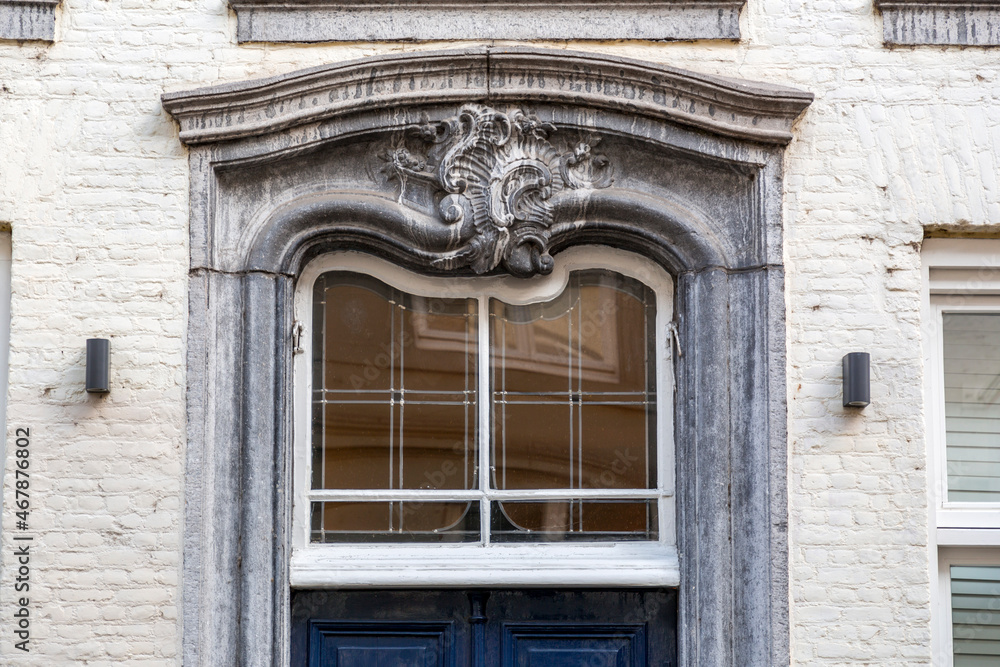 Detail from an ornate European style window of a historical building Detail from an ornate European style window of a historical building