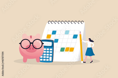 Fotografiet Monthly cost or budget, expense to pay bill, mortgage or debt, plan for savings or investment, money management or credit card payment, smart woman plan her monthly budget with calendar and piggybank