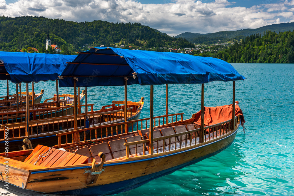 Colorful Wooden Boats on Lake Bled in Slovenia. Famous Tourist Attraction