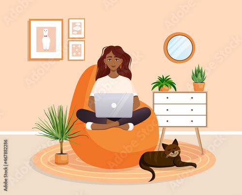 Woman is sitting on a bean bag chair at home at a laptop computer. Remote work, office at home, programming, freelance. Study at home in quarantine. Vector illustration. Cozy interior with a cat.