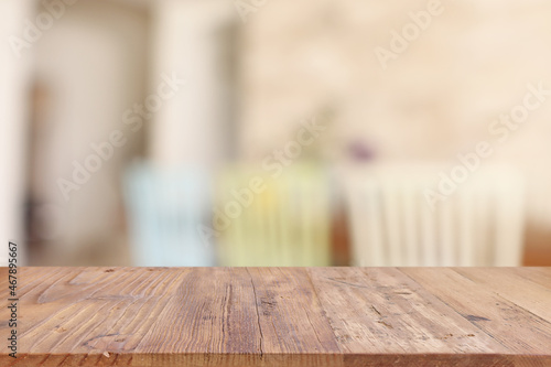 empty table board and defocused indoor background. product display concept © tomertu