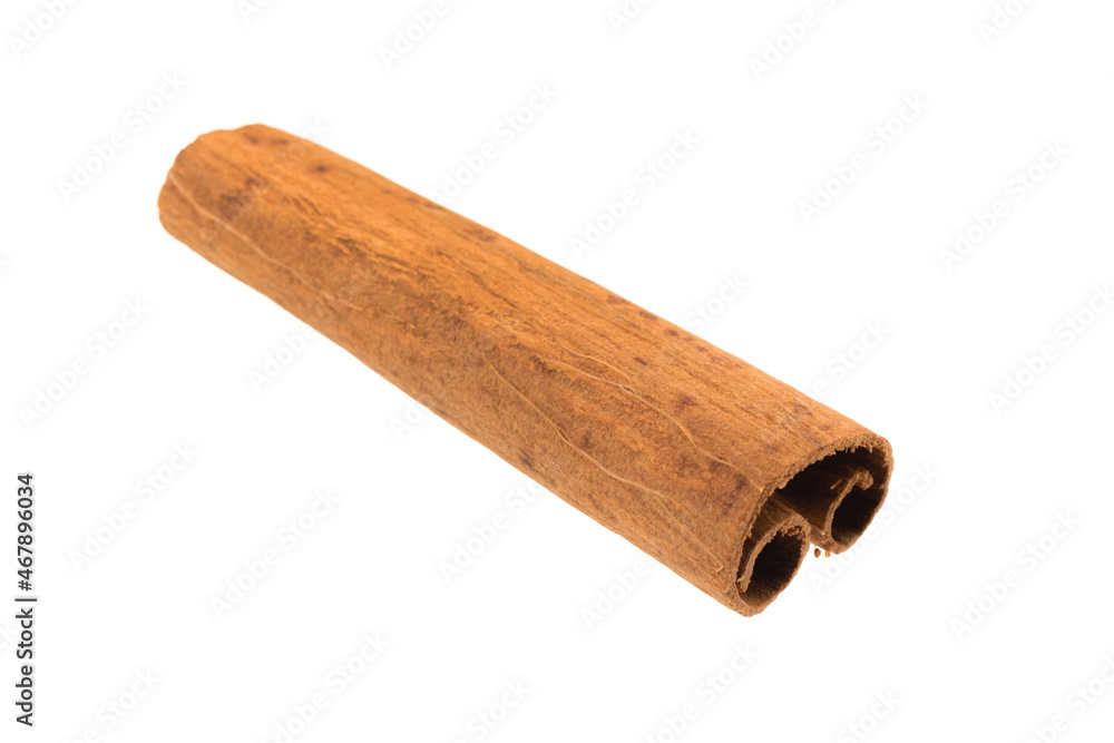 Close-up cinnamon stick isolated on a white background photo Close-up cinnamon stick isolated on a white background photo