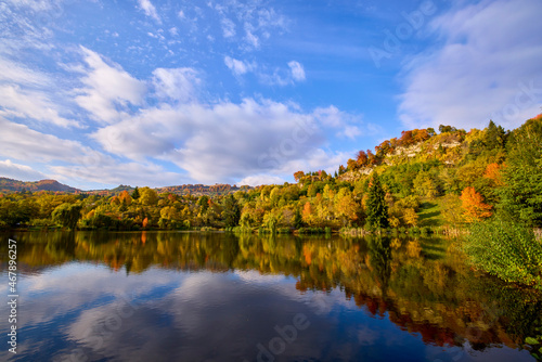 landscape with a mountain lake in autumn on a sunny day © czamfir