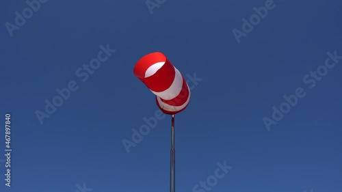 windsock Wind direction and intensity sign on helicopters and airfields. Wind cone used in aviation. Airport wind gauge.