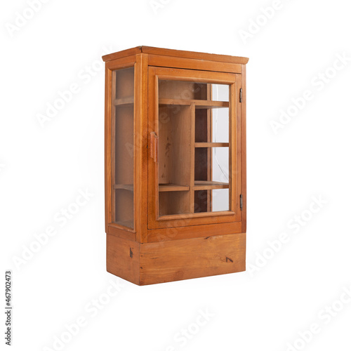 Old wooden medicine cabinet on white background © OsiecK