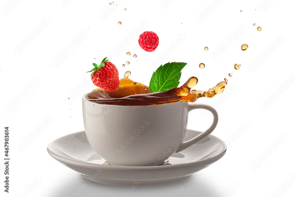 a cup of hot tea with mint leaves, strawberries and raspberries, isolated on a white background a cup of hot tea with mint leaves, strawberries and raspberries, isolated on a white background