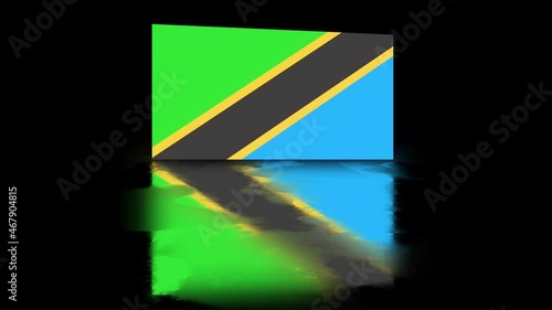 Tanzania Flag revealed with realistic reflection on stylish black background