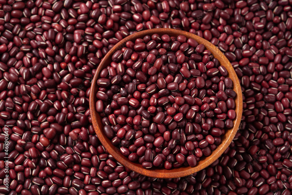 Raw adzuki red bean as background with spoon. Raw adzuki red bean as background with spoon.
