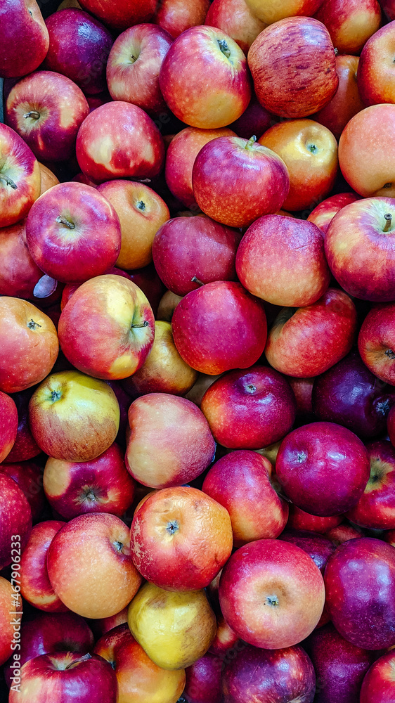 Red and yellow apples on the market. Background, wallpaper. Red and yellow apples on the market. Background, wallpaper.