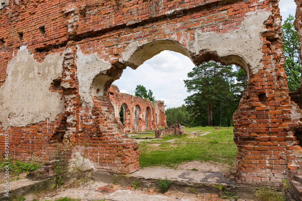 Ruins of main entrance of old palace against the forest