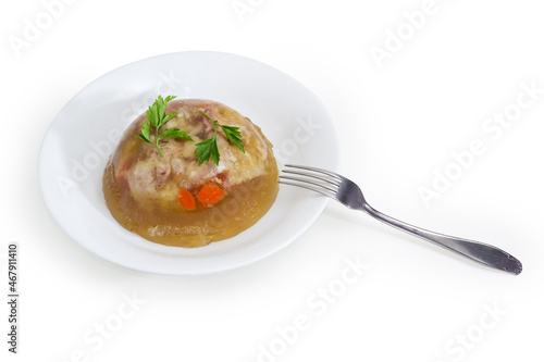 Pork jelly on the dish with fork on white background photo