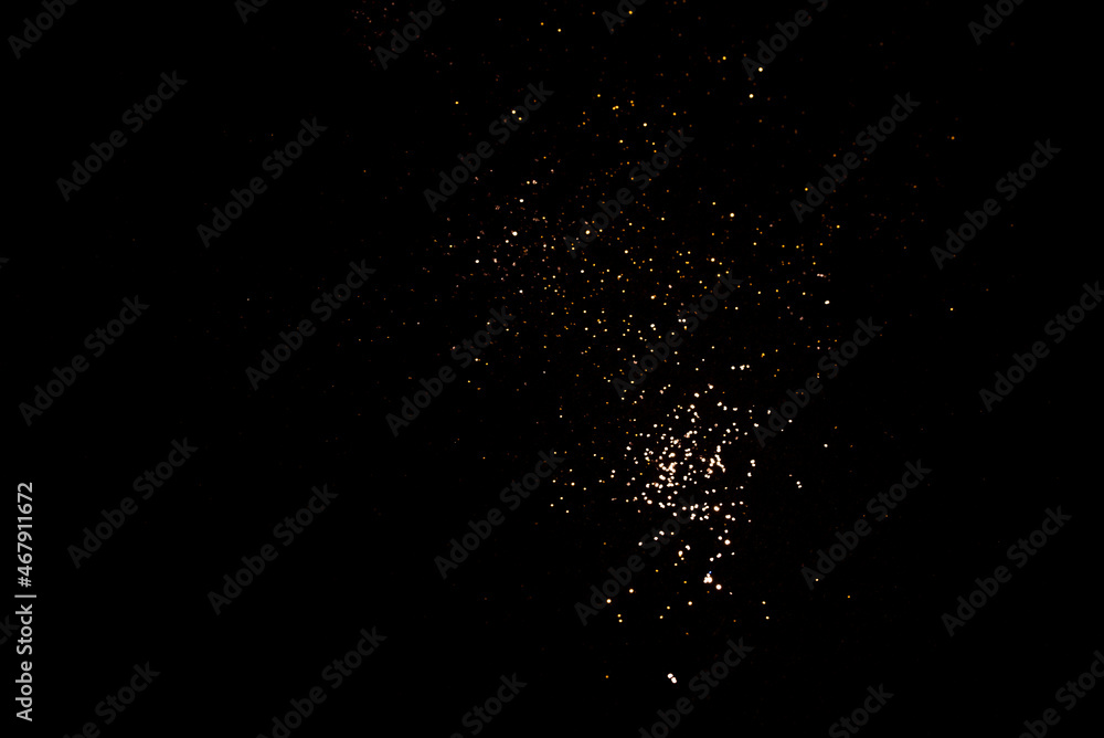Golden abstract bokeh on black background. Golden abstract bokeh on black background.