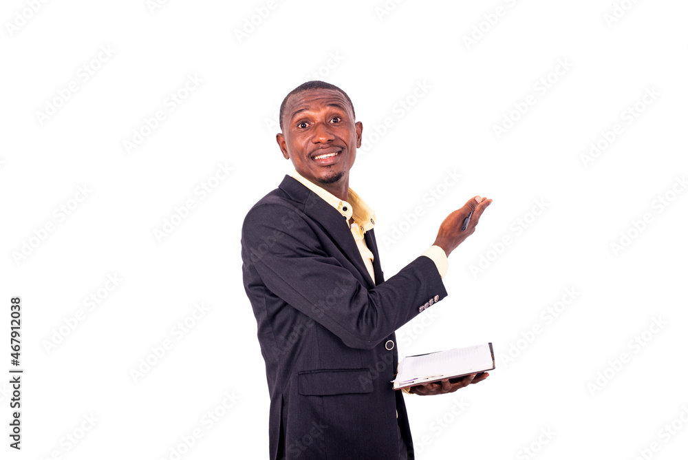 young teacher with notebook explaining her lesson on whiteboard smiling. young teacher with notebook explaining her lesson on whiteboard smiling.