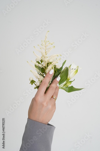 Hand and flowers