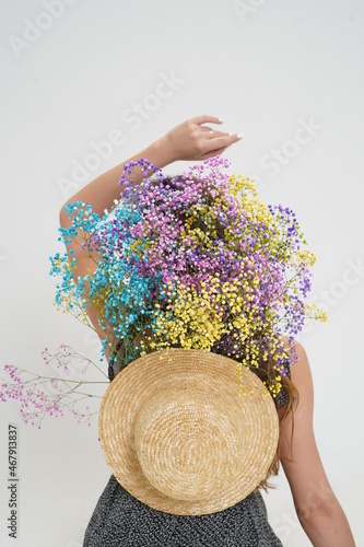 Girl with hat and flowers