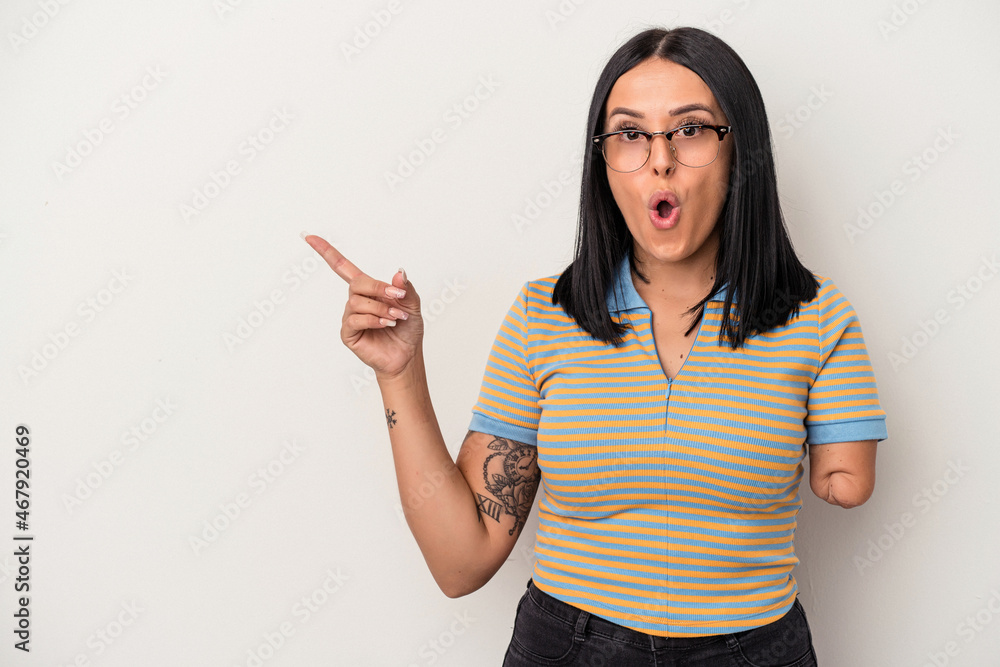 Young caucasian woman with one arm isolated on white background pointing to the side Young caucasian woman with one arm isolated on white background pointing to the side