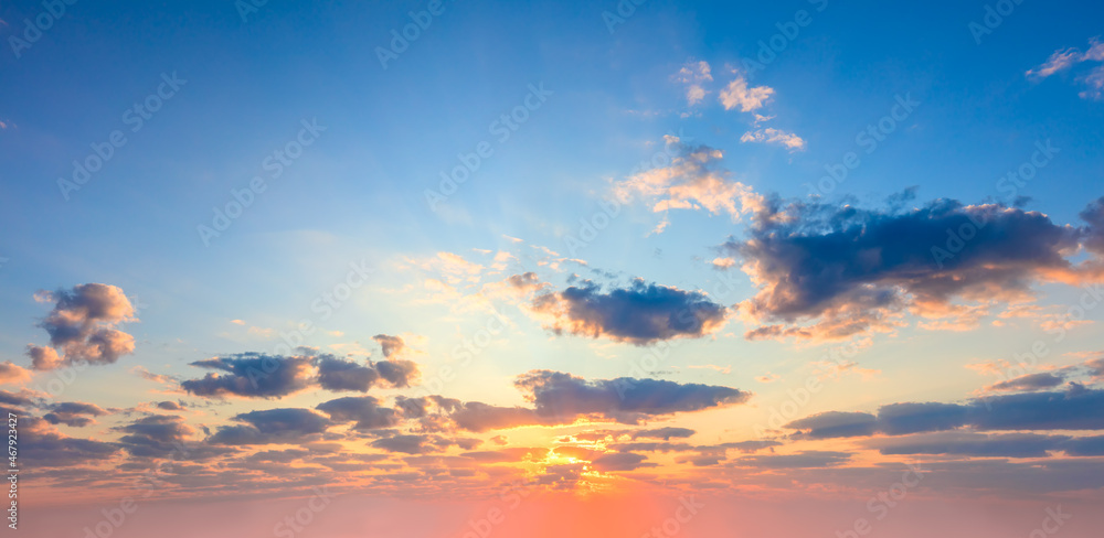 Majestic dramatic sky - sunshine on sunrise sundown sky background with colorful clouds Majestic dramatic sky - sunshine on sunrise sundown sky background with colorful clouds