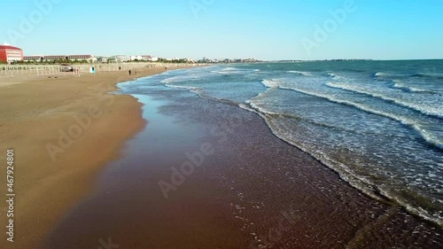 Wavy sea on the coast of the Mediterranean. Antalya beaches with golden sand and clean sea.