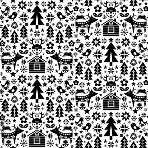 Christmas Scandinavian and Nordic folk art style seamless vector pattern wtih reindeer, birds, snowflakes and flowers - black and white textile or fabric print
