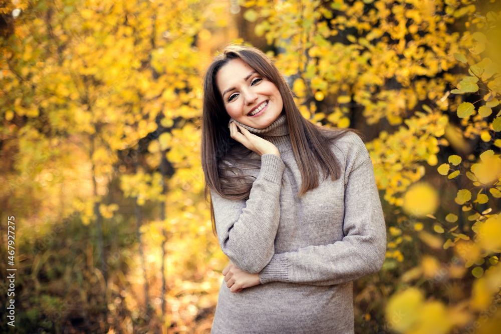 Portrait of a one happy dreamy beautiful woman enjoy on the street fun cute smile on blurred background close up in autumn forest, close up. Portrait of a one happy dreamy beautiful woman enjoy on the street fun cute smile on blurred background close up in autumn forest, close up.