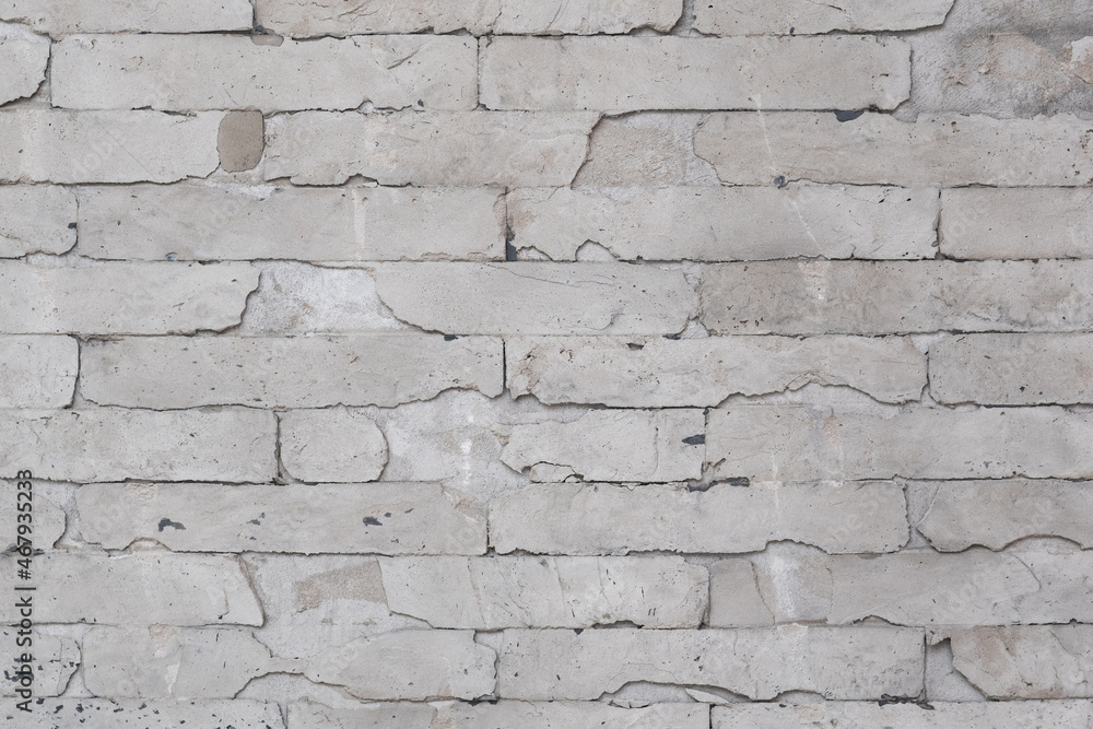 Gray concrete wall with brick pattern Gray concrete wall with brick pattern