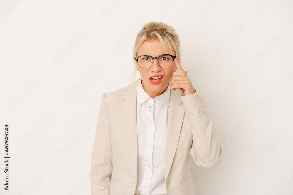 Young business Russian woman isolated on white background showing a disappointment gesture with forefinger. Young business Russian woman isolated on white background showing a disappointment gesture with forefinger.