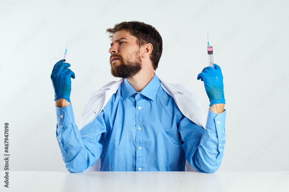 laboratory assistant sitting at his desk experiment analyzes medicine laboratory assistant sitting at his desk experiment analyzes medicine