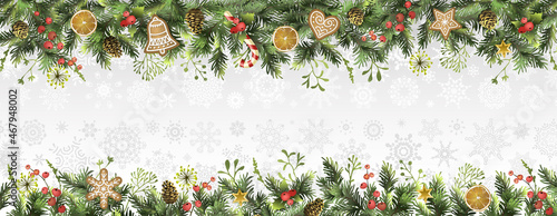 Christmas holidays background with fir branches, fir cones, holly berry, orange slices, cookies and space for text. Postcard.