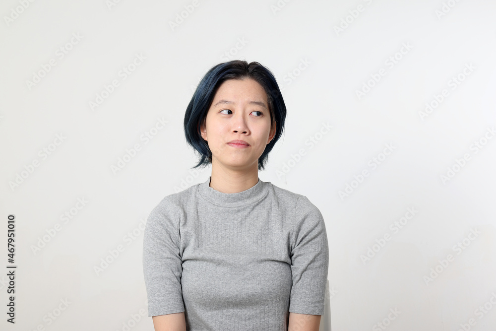 Young attractive Asian chinese malay woman pose face body expression mode emotion on white background look side Young attractive Asian chinese malay woman pose face body expression mode emotion on white background look side