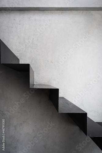 Stairway with black metal structure banister building architecture loft-style railings interior design contemporary.