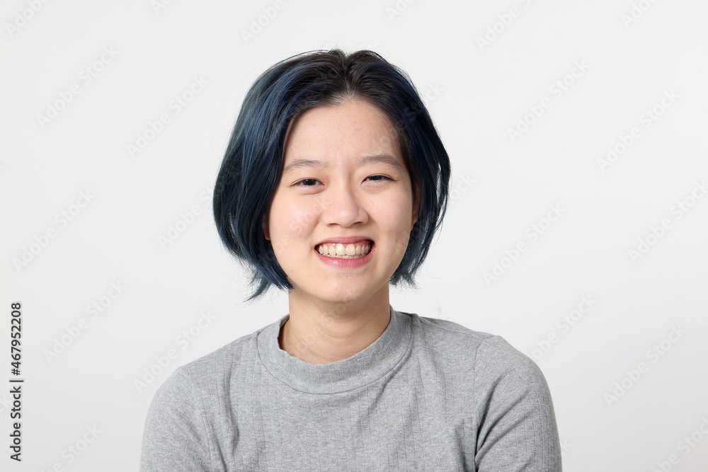 Young attractive Asian chinese malay woman pose face body expression mode emotion on white background laugh smile happy Young attractive Asian chinese malay woman pose face body expression mode emotion on white background laugh smile happy