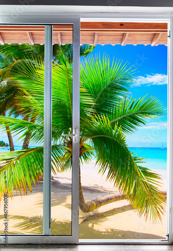 large glass door overlooking the beach