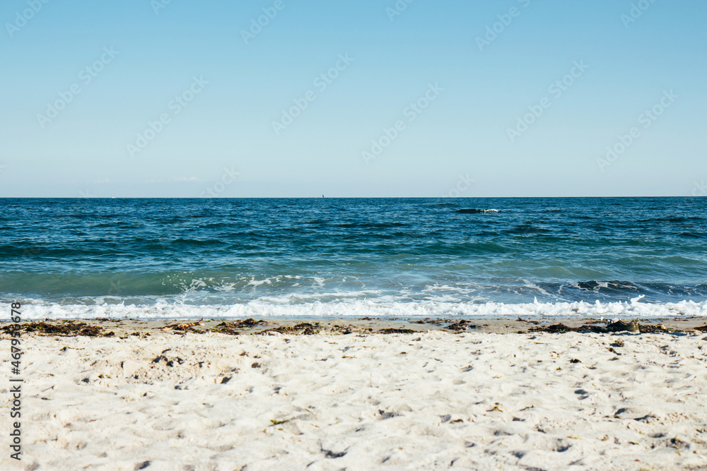 Deep blue ocean water and blue sky background. Horizon of the sea