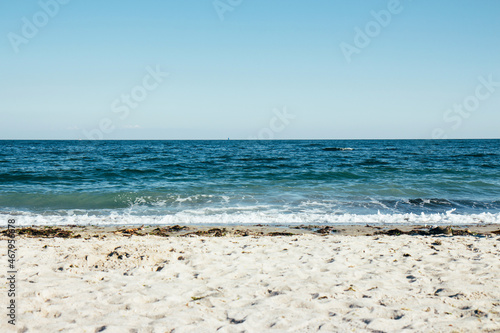 Fototapeta Naklejka Na Ścianę i Meble -  Deep blue ocean water and blue sky background. Horizon of the sea