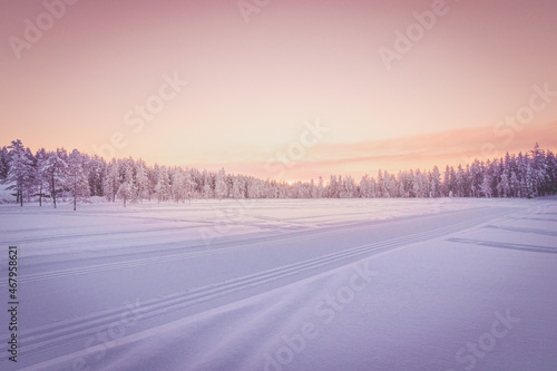 sunrise in winter, Lapland, Finland © calliopepapas
