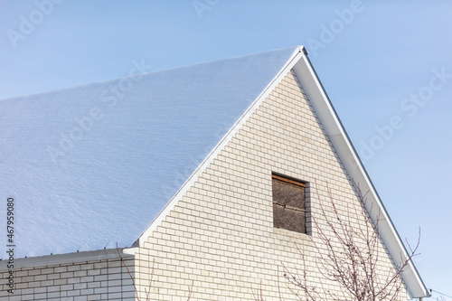 Snow on the roof of the house