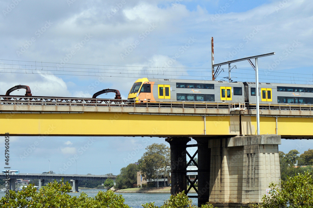 Fototapeta premium A railway bridge over the Parramatta River at Meadowbank in Sydney, Australia