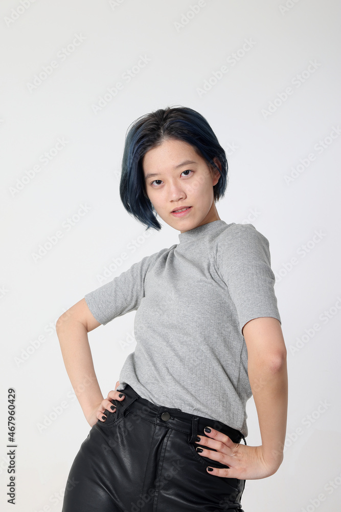 Young attractive Asian chinese malay woman pose face body expression mode emotion on white background fashion walk twist Young attractive Asian chinese malay woman pose face body expression mode emotion on white background fashion walk twist